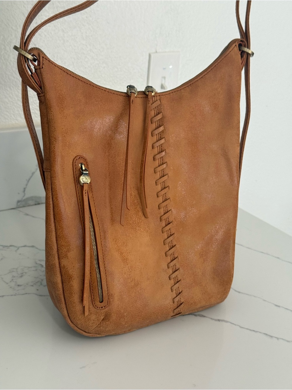 HOBO Merrin Convertible Backpack Whiskey Leather Whipstitch with shimmer